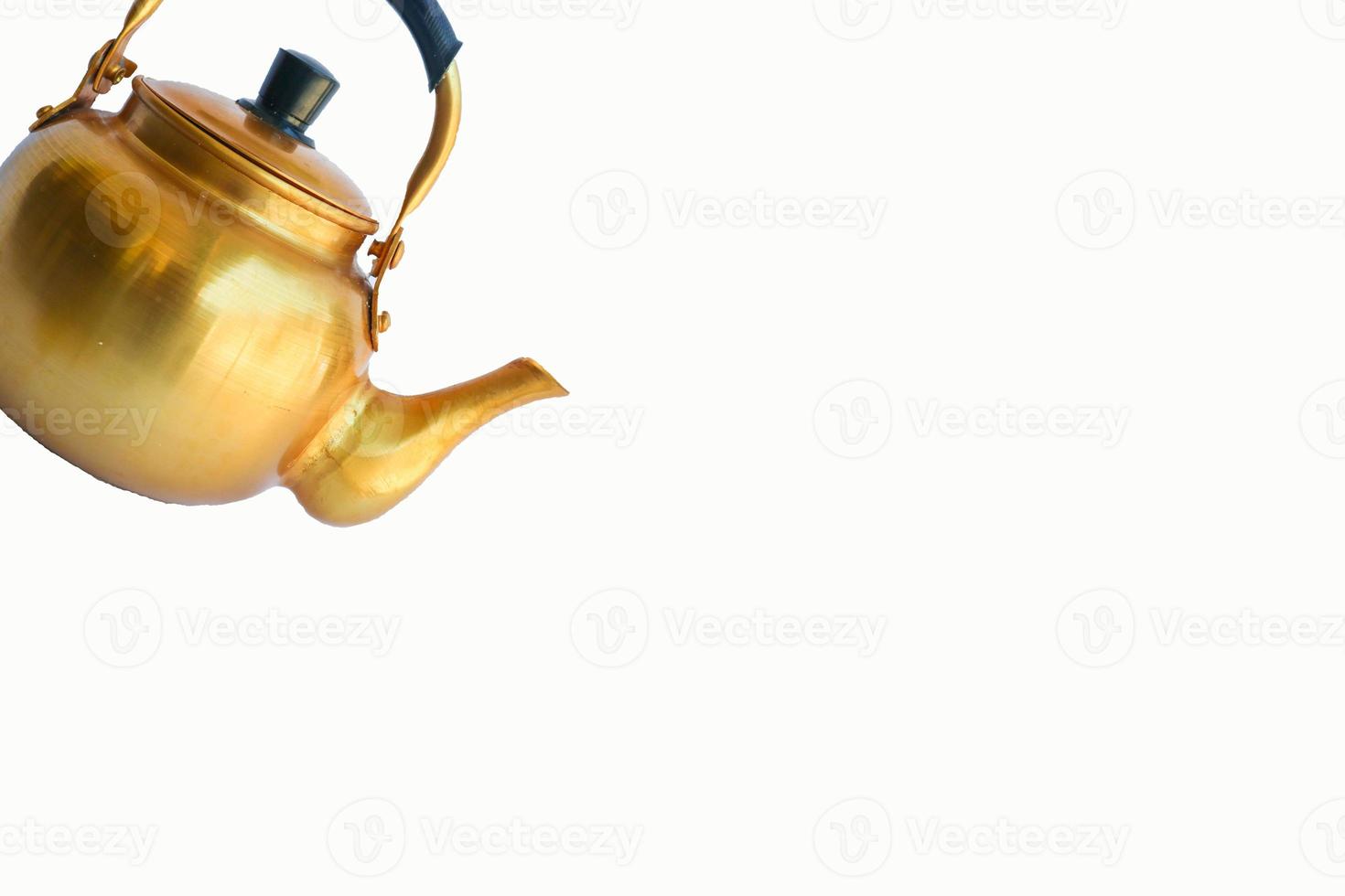 teapot, jug, Copper desert tea pot, antique metal teapot isolated on white background, antique kettle,golden teapot, metal teapot, Chinese tea pot on white background, antique teapot, metal kettle. photo