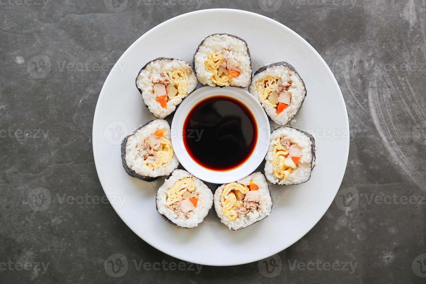 kimbap or gimbap is Korean roll made from steamed white rice  and various other ingredients, this food from south korea photo