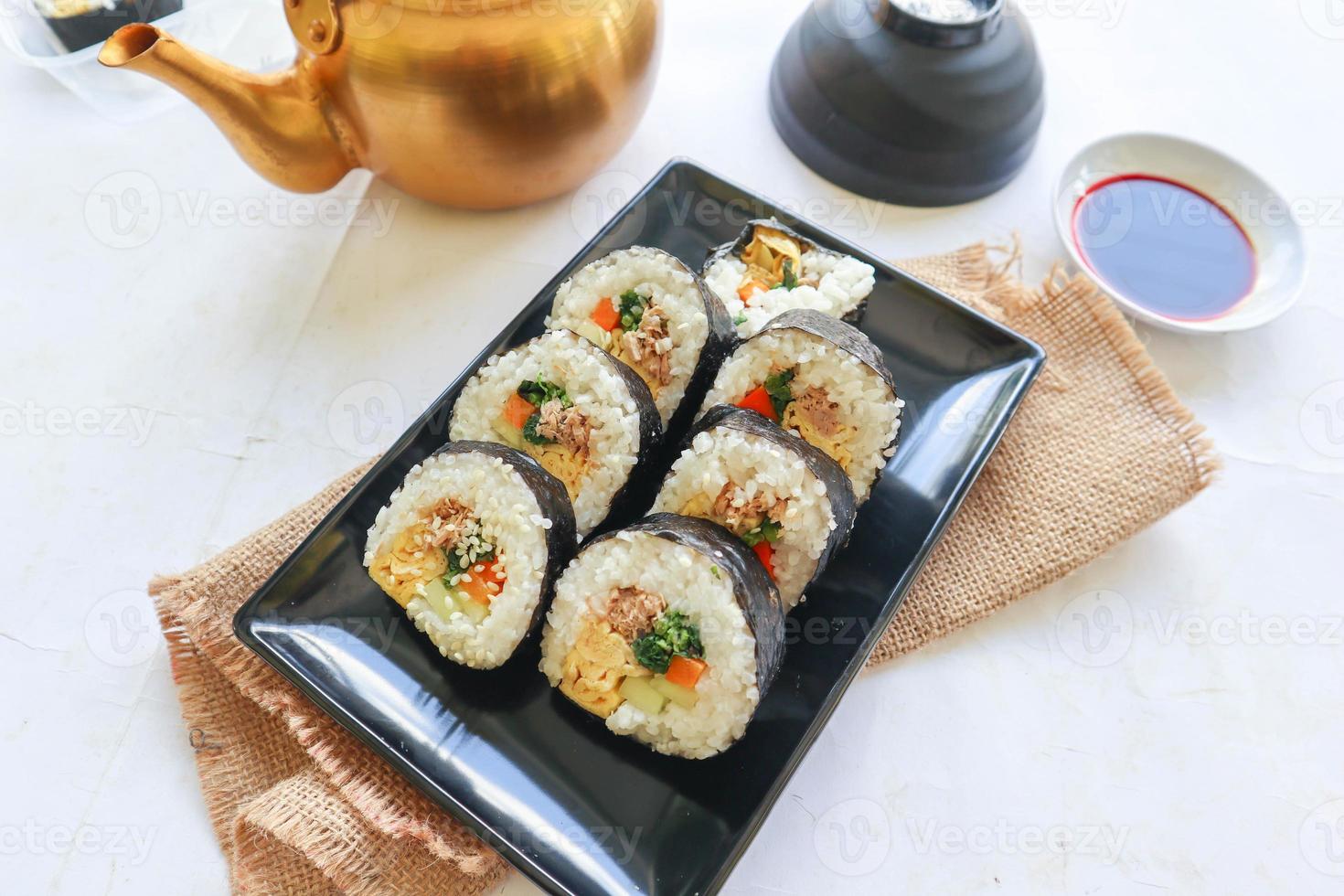 kimbap or gimbap is Korean roll Gimbap, kimbob made from steamed white rice bap and various other ingredients, this food from south korea photo
