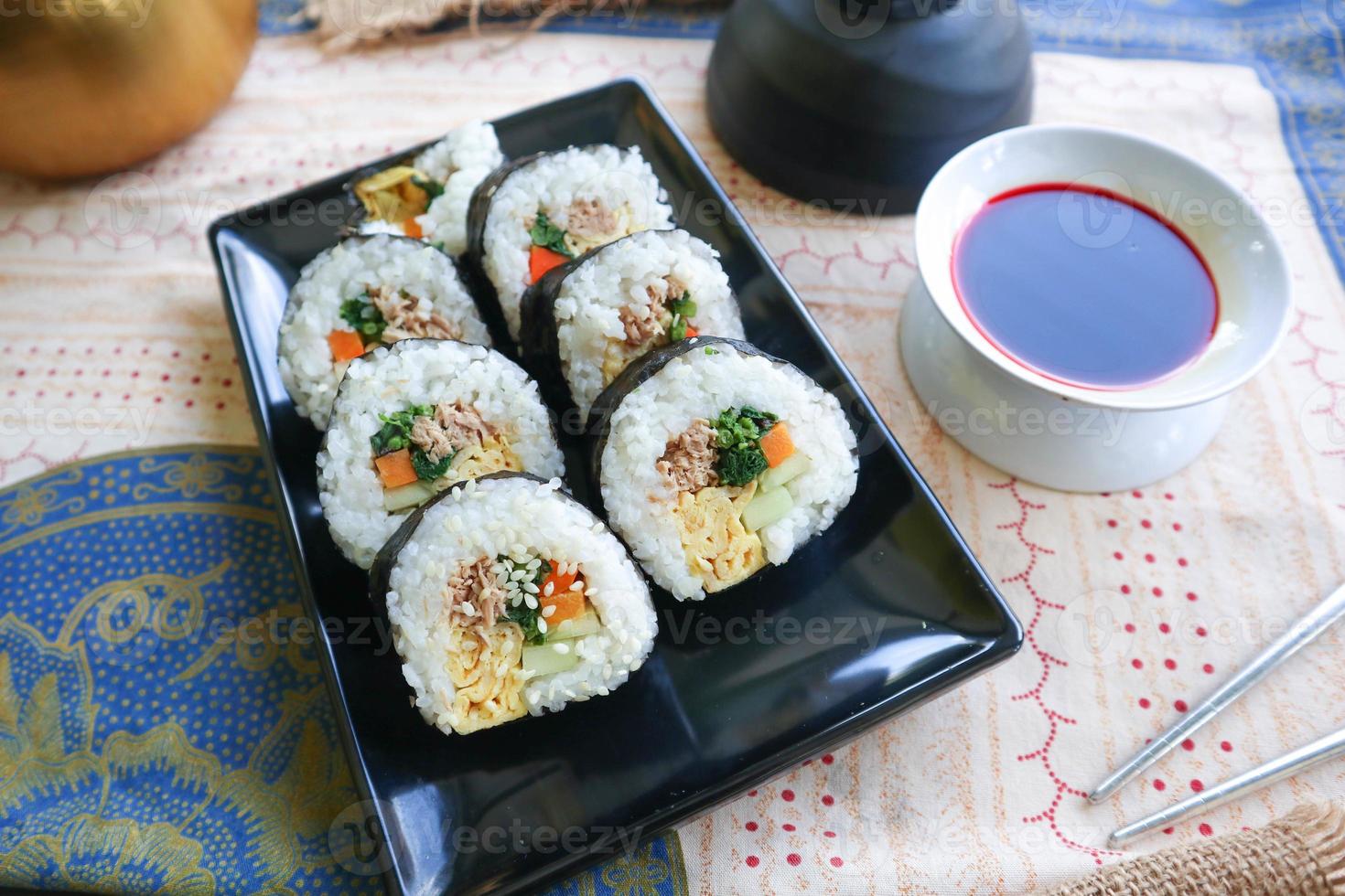kimbap or gimbap is Korean roll Gimbap, kimbob made from steamed white rice bap and various other ingredients, this food from south korea photo