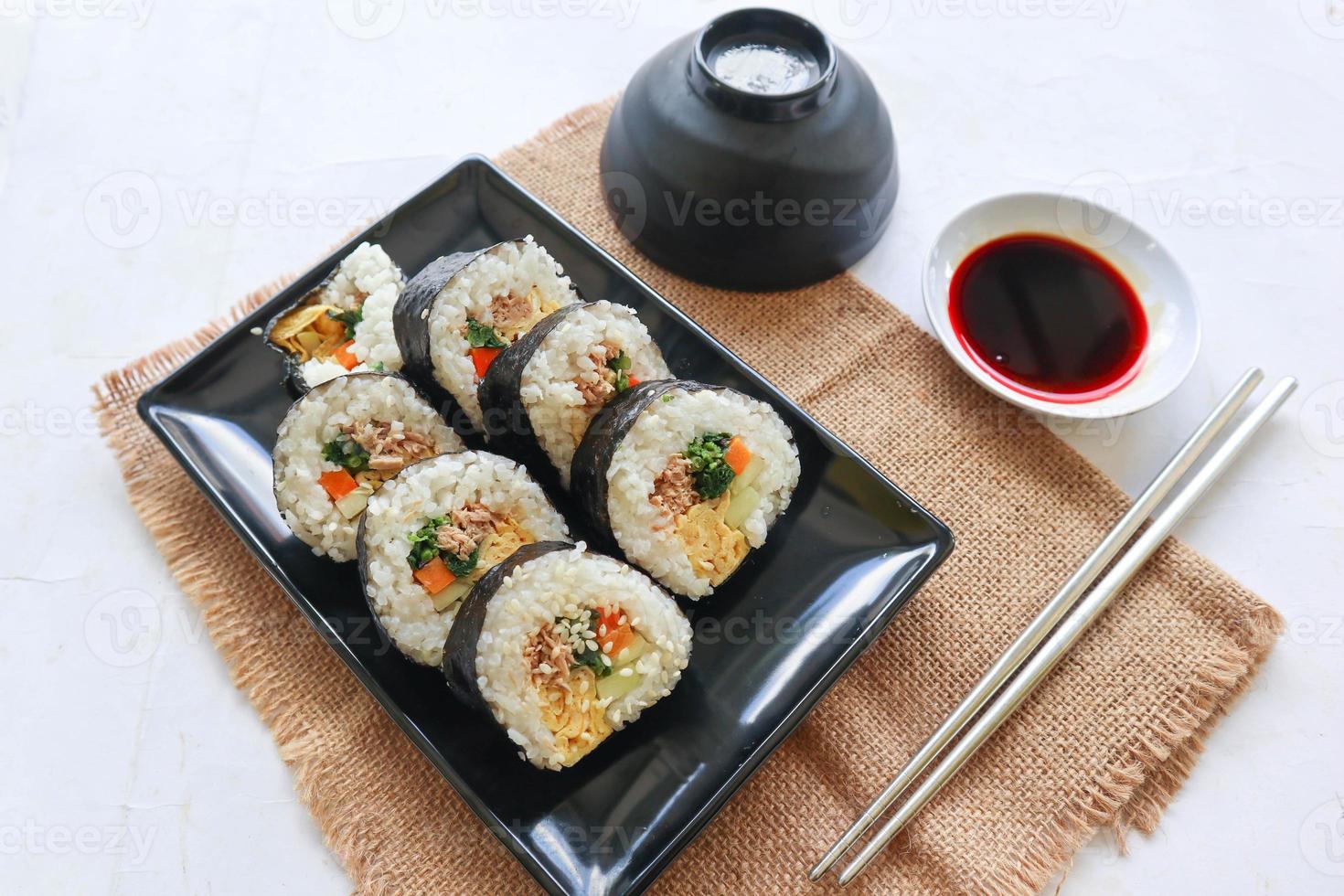 kimbap or gimbap is Korean roll Gimbap, kimbob made from steamed white rice bap and various other ingredients, this food from south korea photo