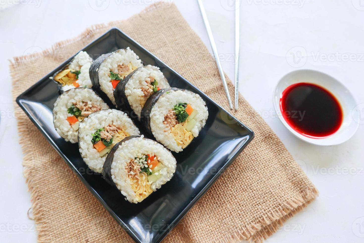 kimbap or gimbap is Korean roll Gimbap, kimbob made from steamed white rice bap and various other ingredients, this food from south korea photo