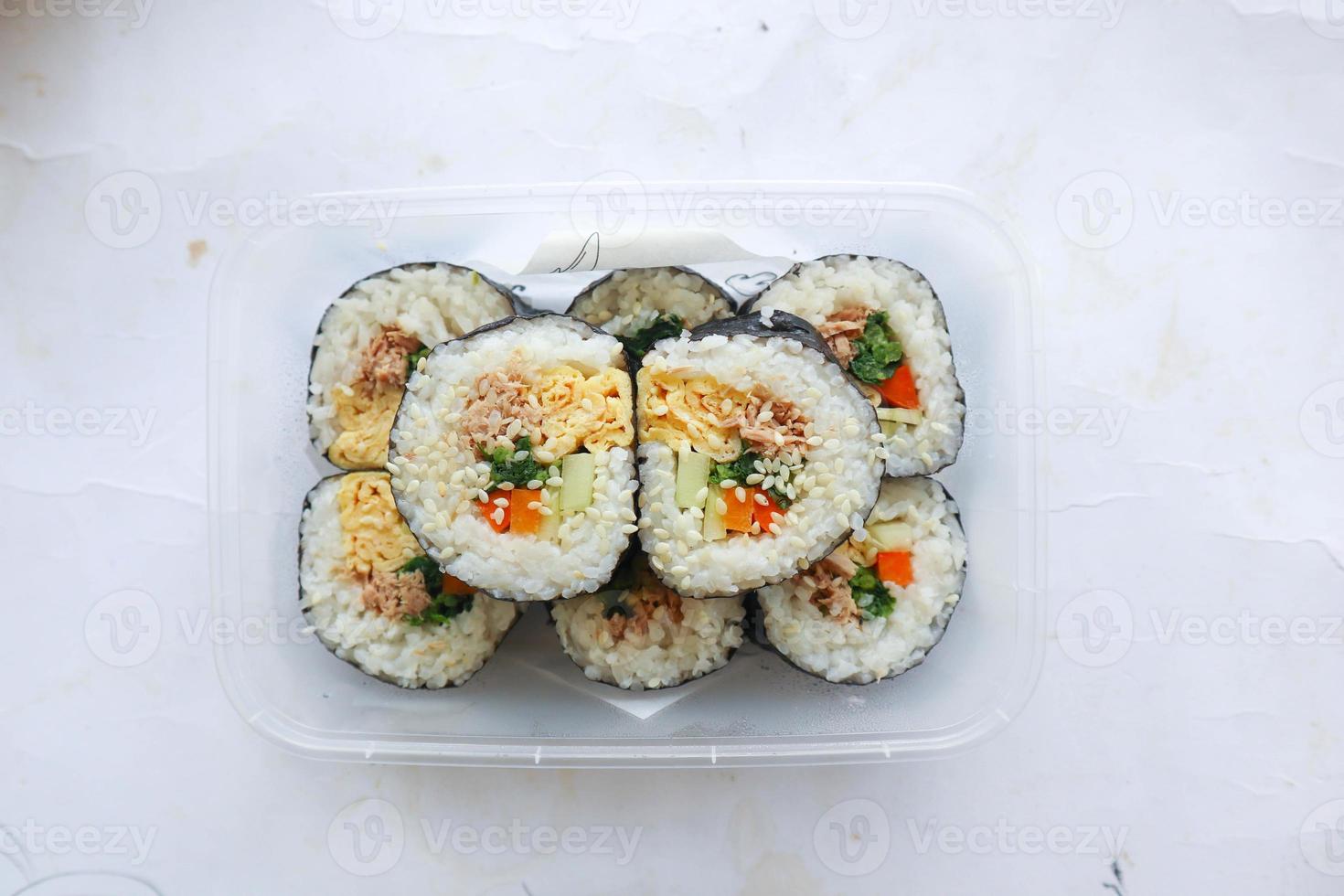 kimbap or gimbap is Korean roll Gimbap, kimbob made from steamed white rice bap and various other ingredients, this food from south korea photo