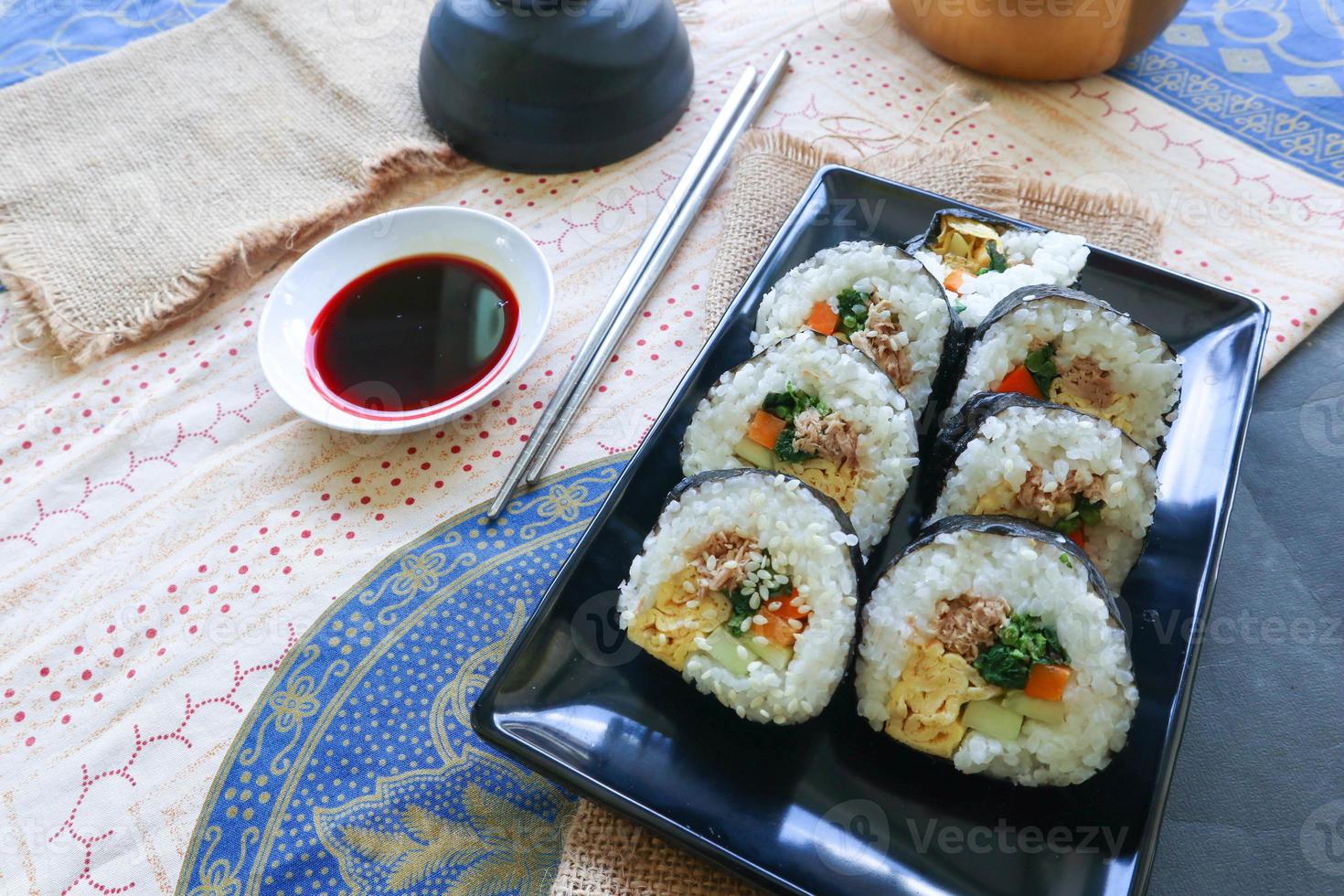 kimbap or gimbap is Korean roll Gimbap, kimbob made from steamed white rice bap and various other ingredients, this food from south korea photo