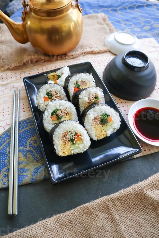 kimbap or gimbap is Korean roll Gimbap, kimbob made from steamed white rice bap and various other ingredients, this food from south korea photo