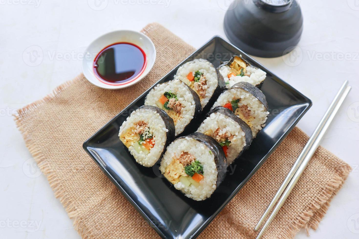 kimbap or gimbap is Korean roll Gimbap, kimbob made from steamed white rice bap and various other ingredients, this food from south korea photo