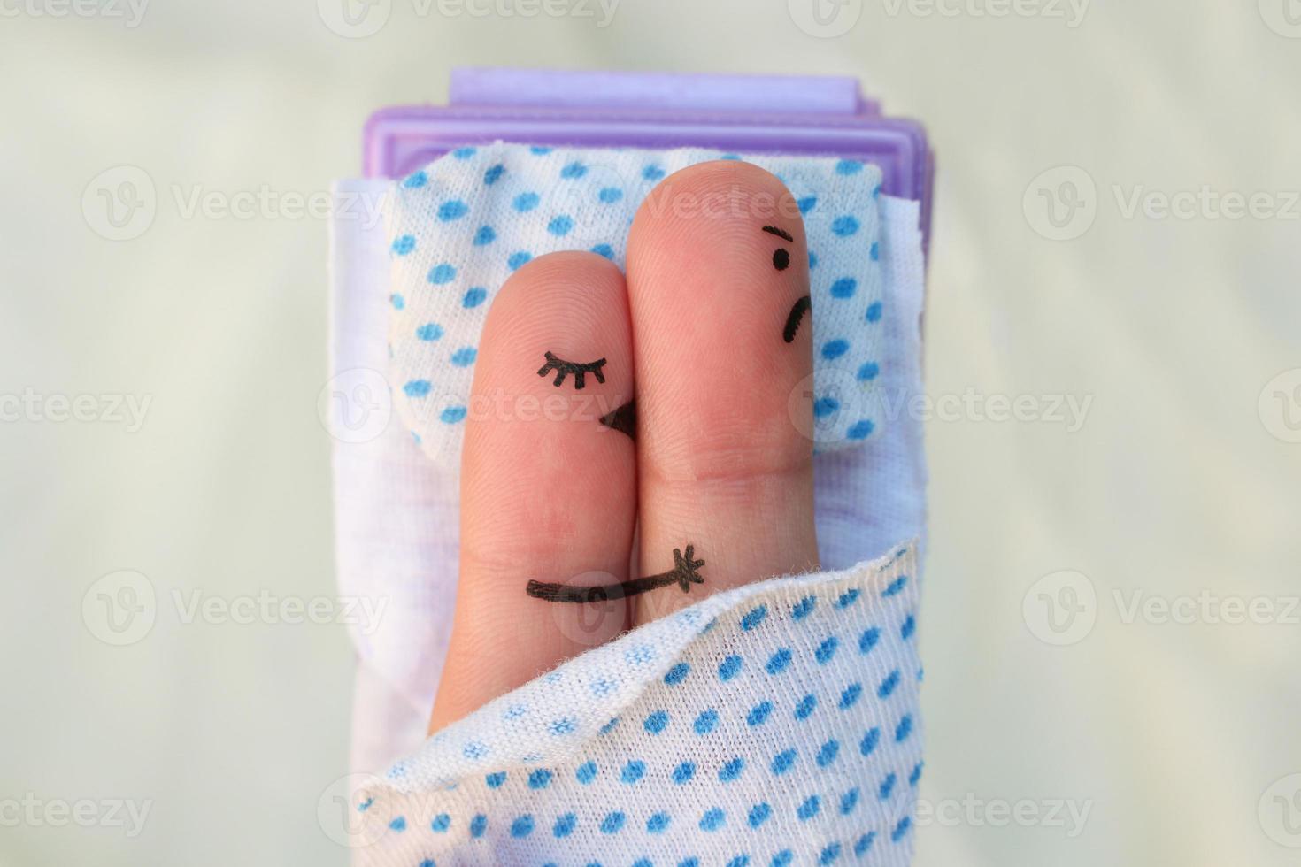 Fingers art of couple. At man problem in bed. photo