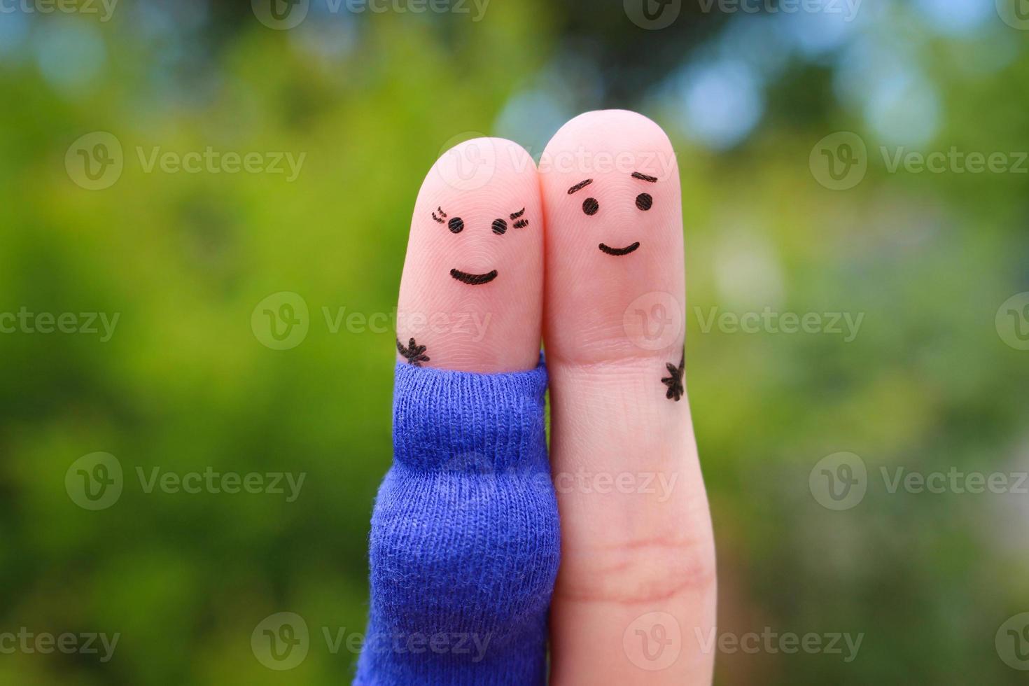 Fingers art of happy couple. Woman is pregnant. photo