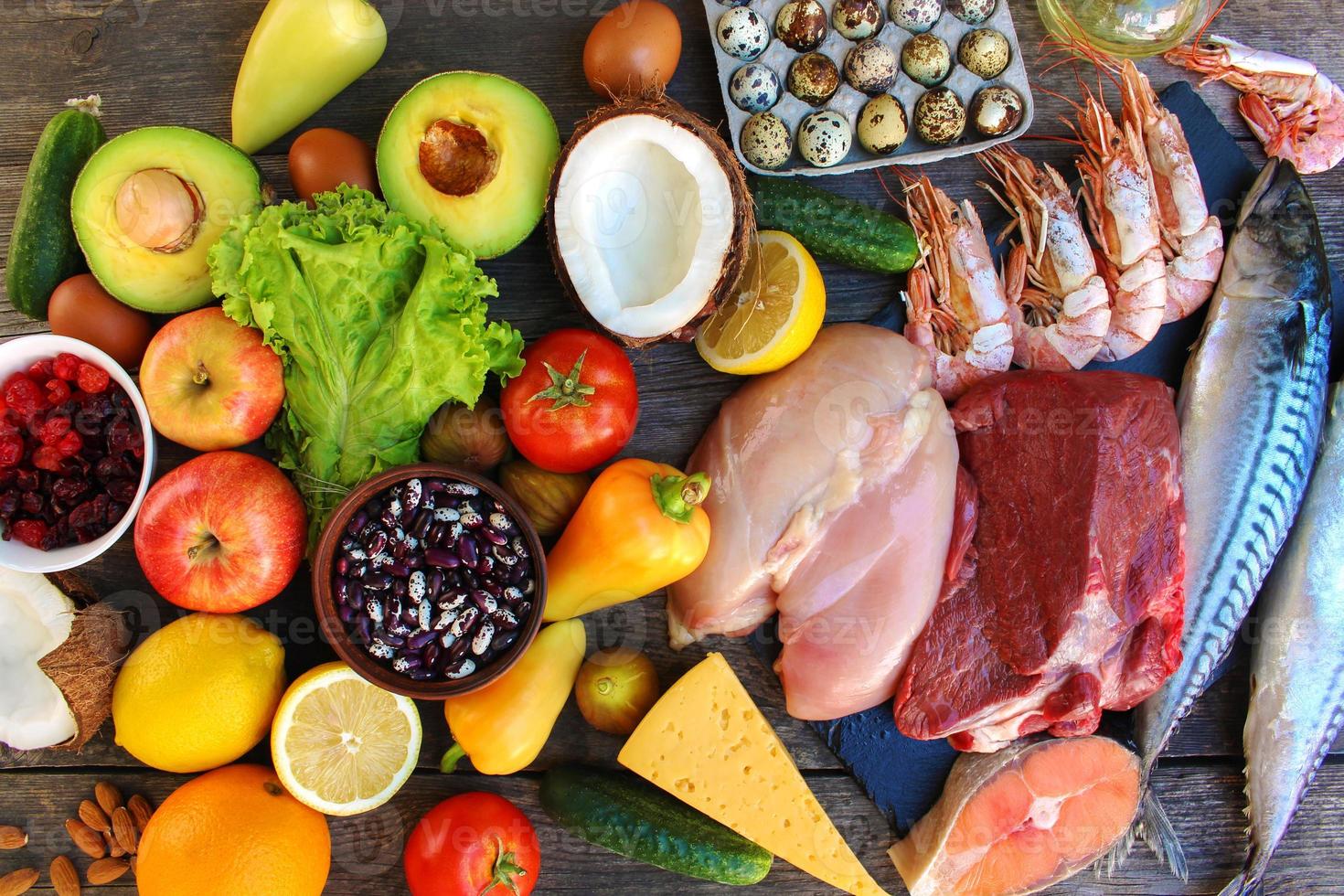 Healthy food on old wooden background. Concept of proper nutrition. Top view. Flat lay. photo