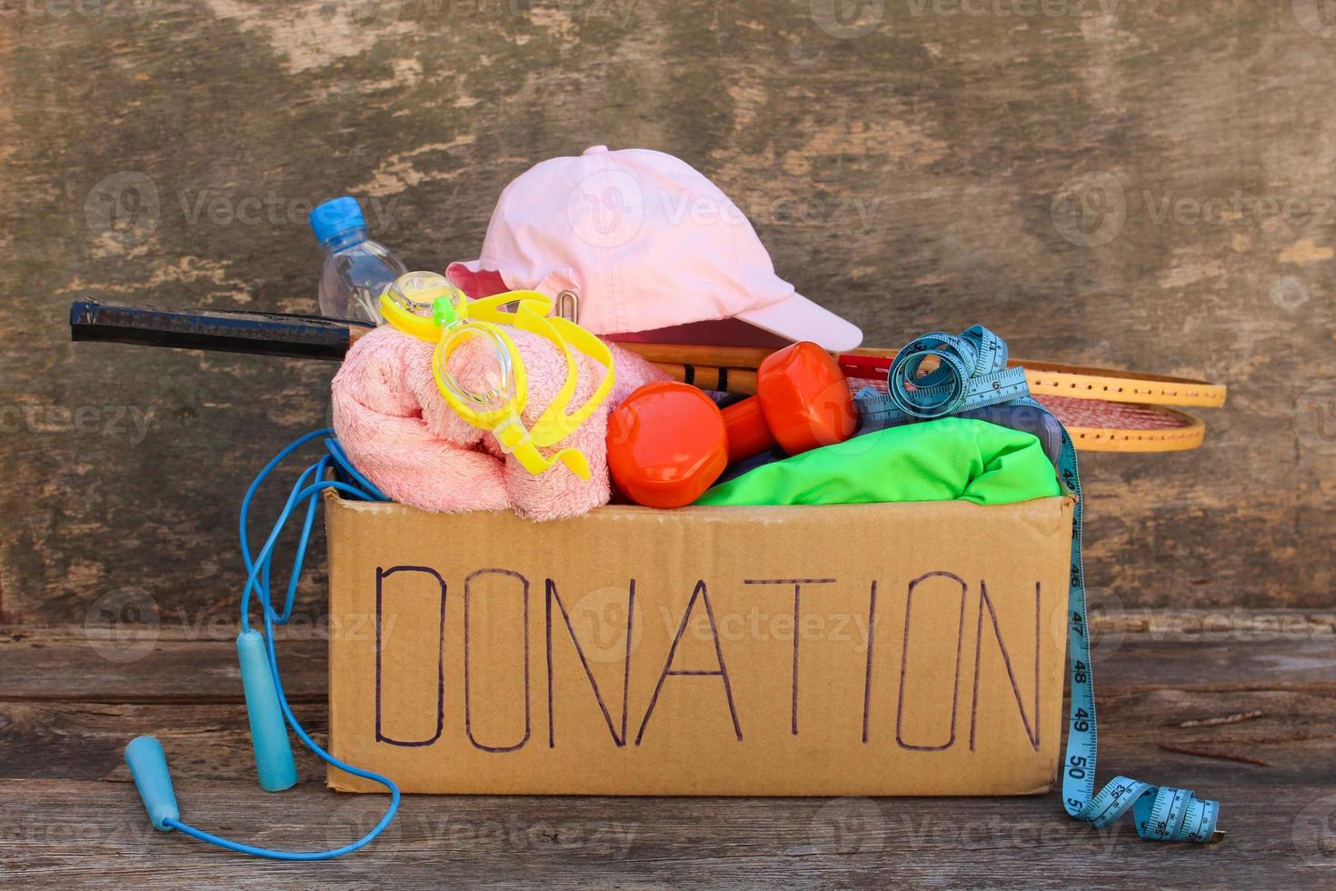 Donation box with sporting goods photo