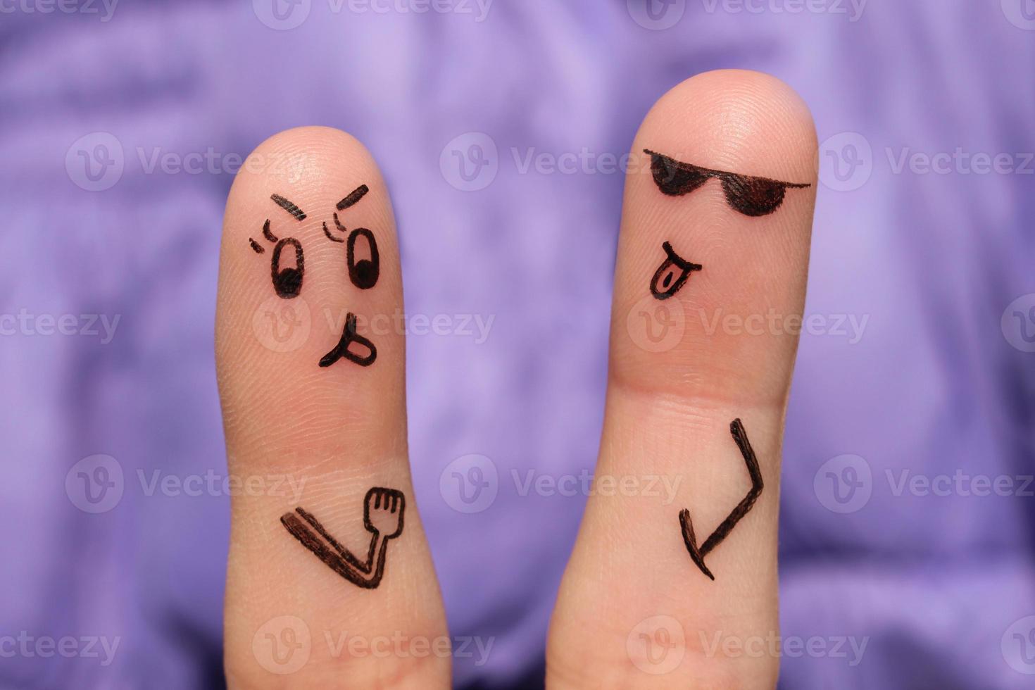 Fingers art of couple. Pair argues, they shows the languages to each other. photo