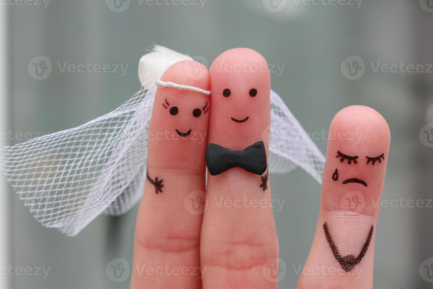 Fingers art of Happy couple to get married. Other woman upset. photo