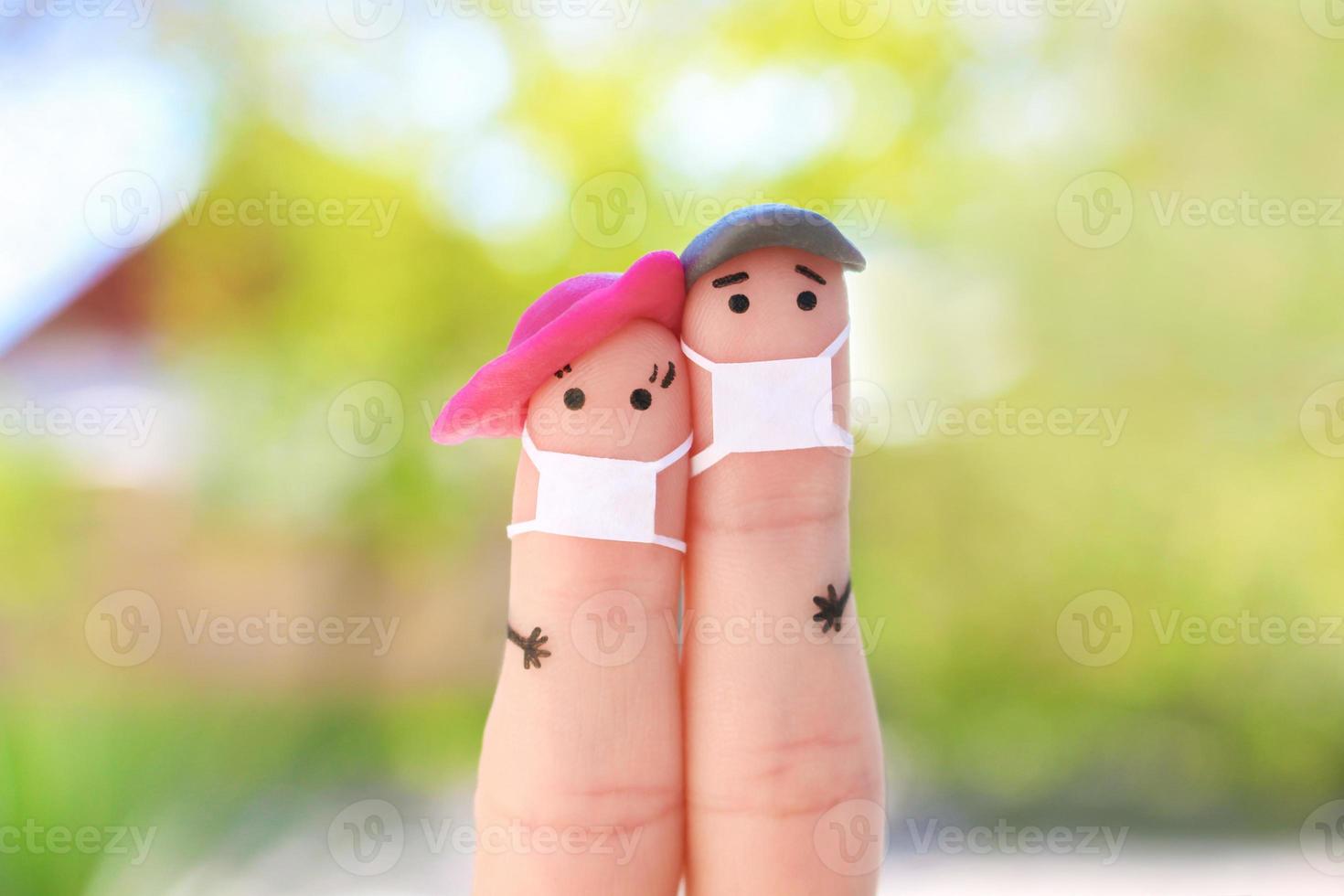 Fingers art of couple with face mask on walk. photo