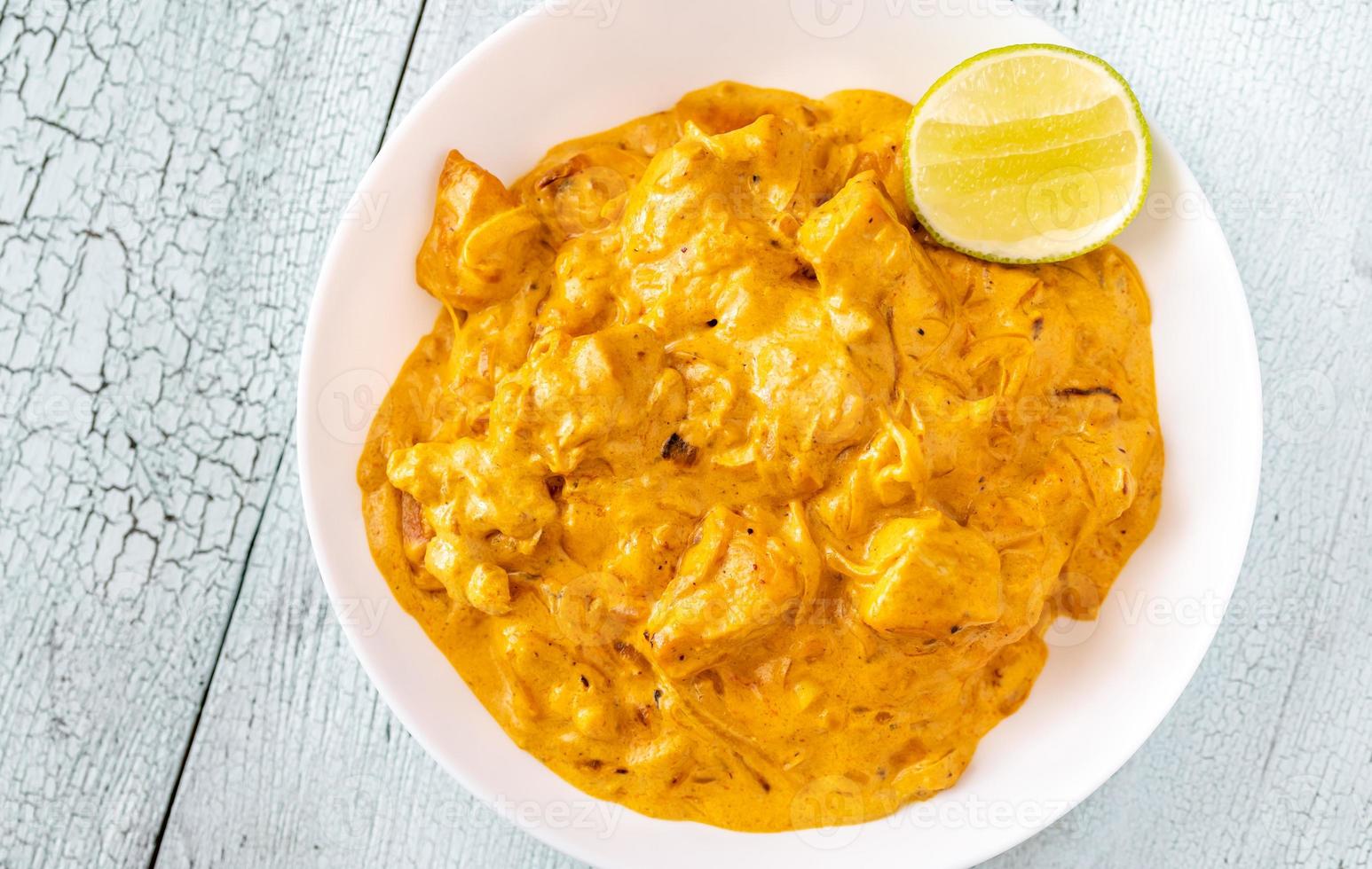 Bowl of chicken curry photo