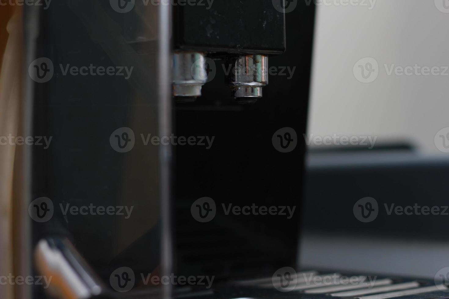 Detailed photo of black and metallic coffee brewer. coffee equipment concept photo.