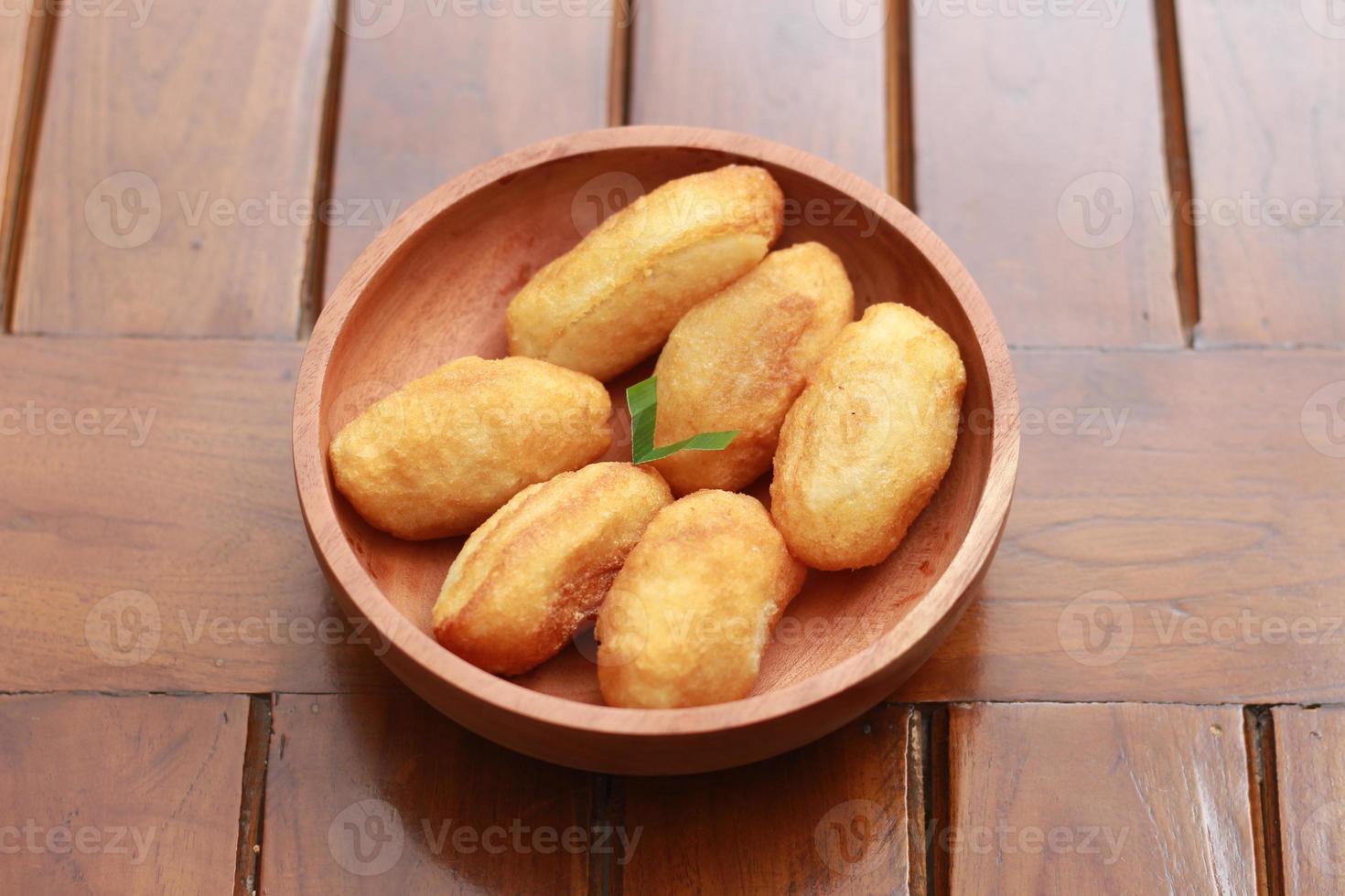 Comro or combro, a traditional Javanese snack made of deep fried grated cassava filled with a savory mix of oncom or fermented soy bean cake and chili photo