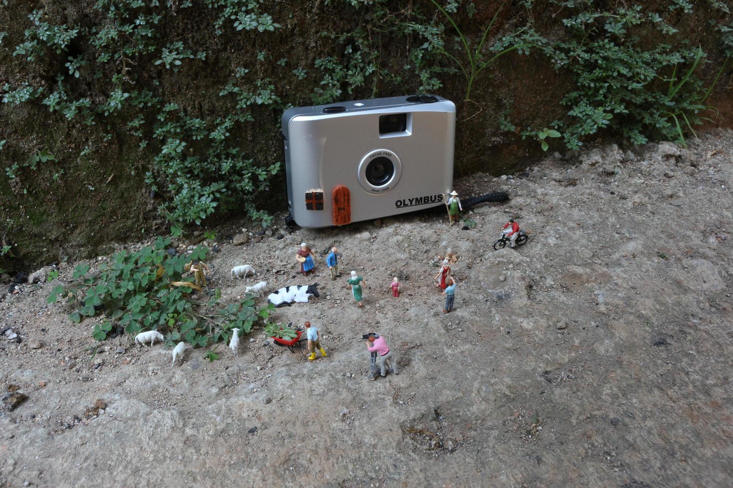 Bogor, Indonesia - October, 22 2022. Miniature figure of crowds of people with their respective activities. Concept of social life. photo