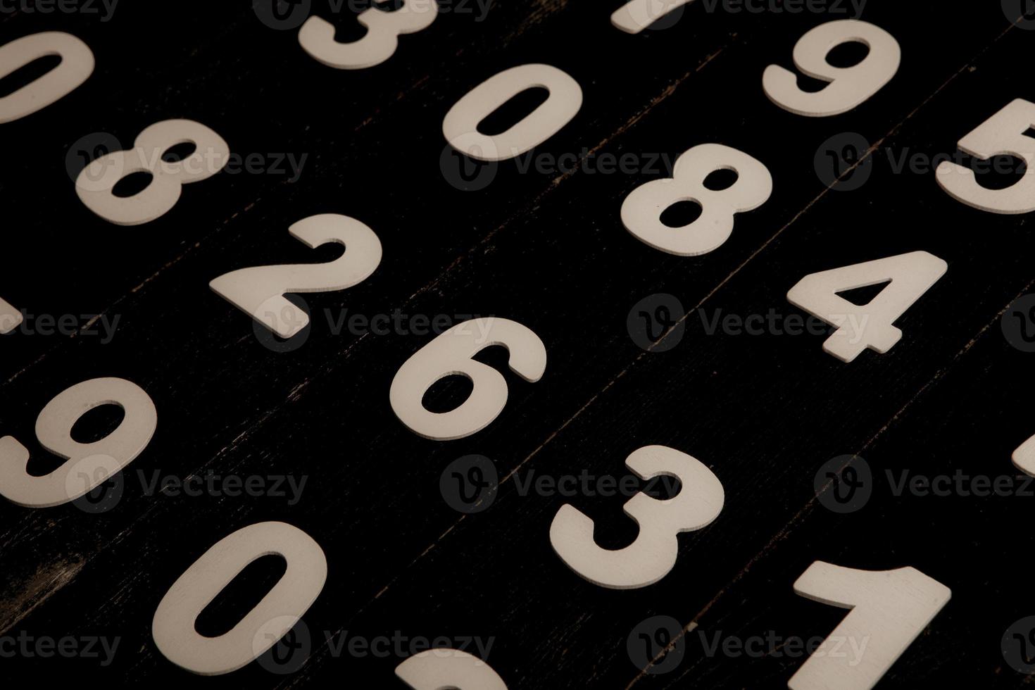 Background of numbers. from zero to nine. Finance data concept. Mathematic. Seamless pattern with numbers. financial crisis concept. Business success. photo