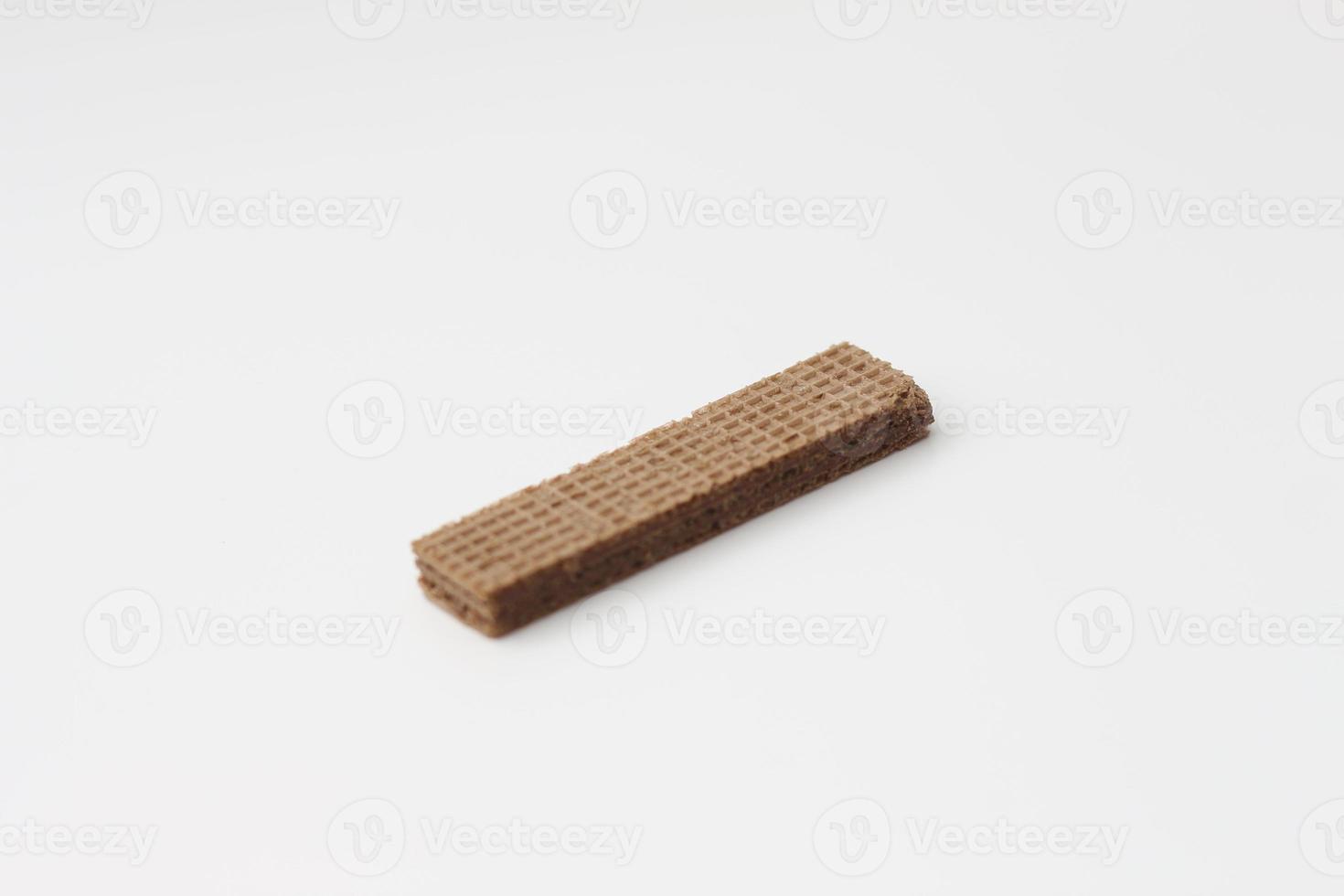 a close up of chocolate wafers isolated on white background. photo