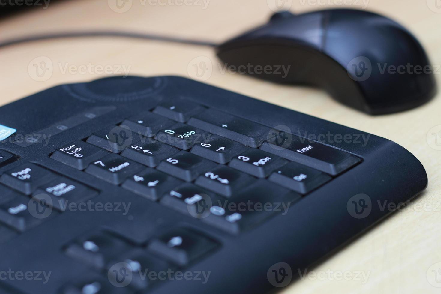 a photo of a black mouse and keyboard to work with. Technology equipment concept photo.