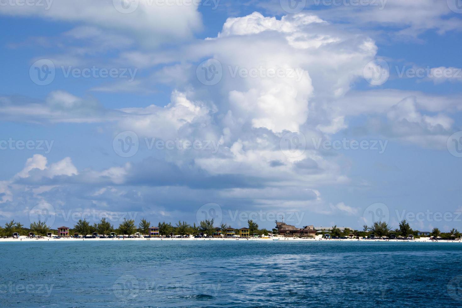 Half Moon Cay Island Tourist Beach And Clouds photo