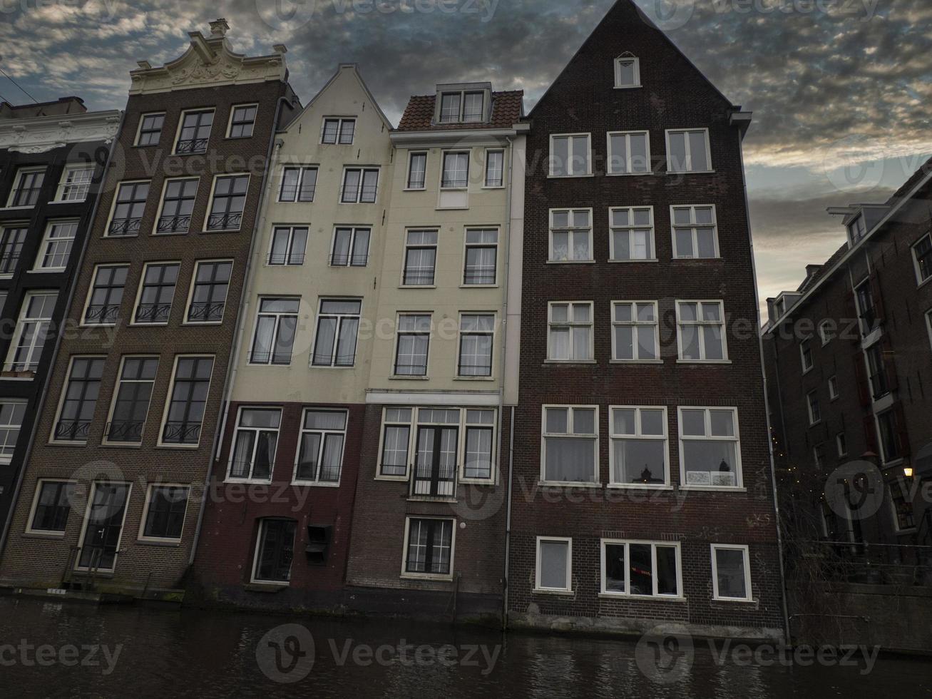 amsterdam old houses view from canals photo