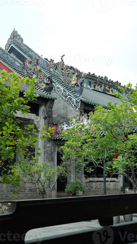 The old Chinese school buildings located in Guangzhou city of the China with the beautiful stone and wooden sculpture photo