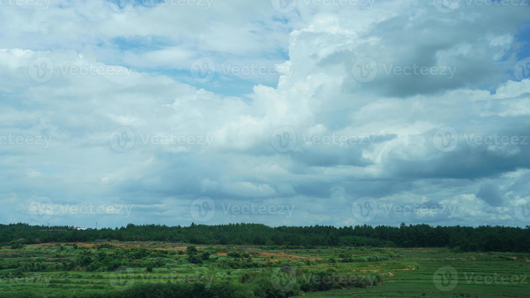 The beautiful countryside view from the runny train on the south of the China photo