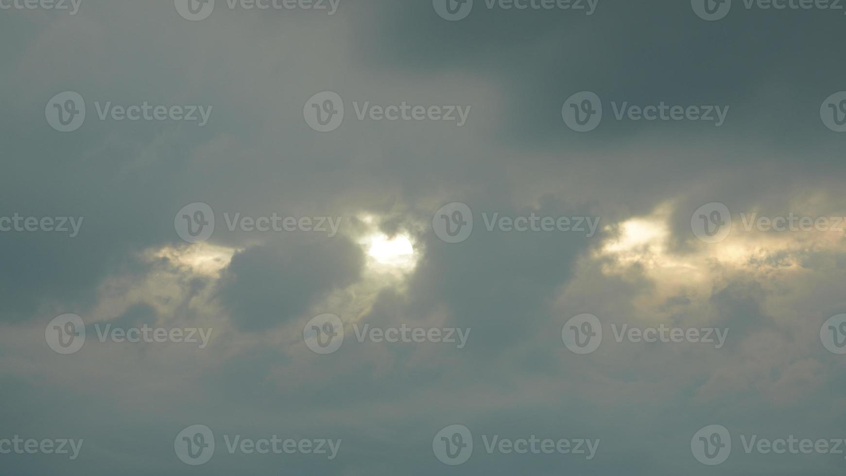The beautiful sunset sky view with the colorful clouds and warm lights in the sky photo