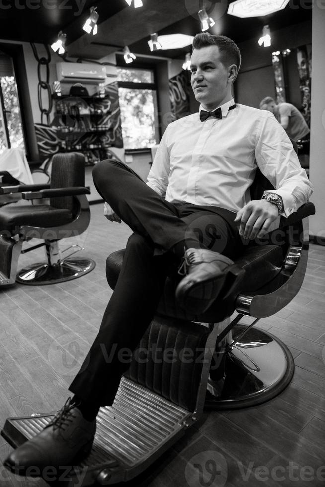 groom in the barber shop photo