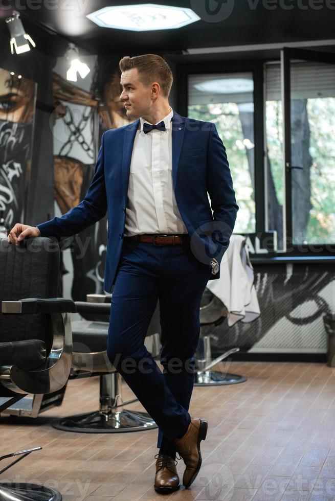 groom in the barber shop photo