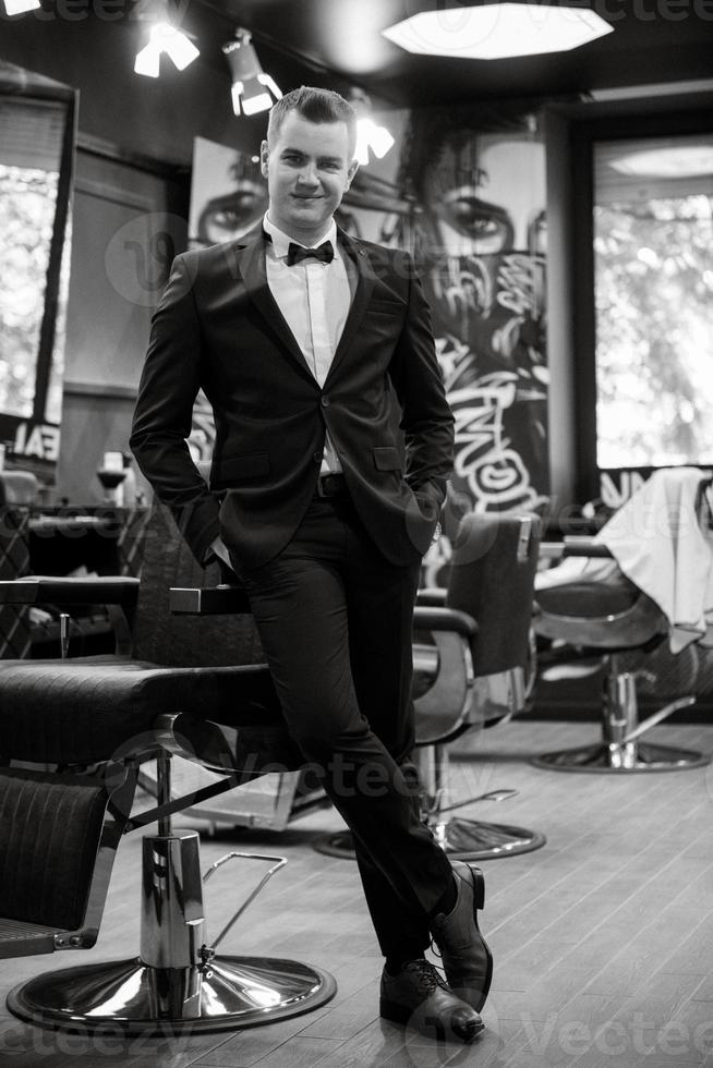 groom in the barber shop photo