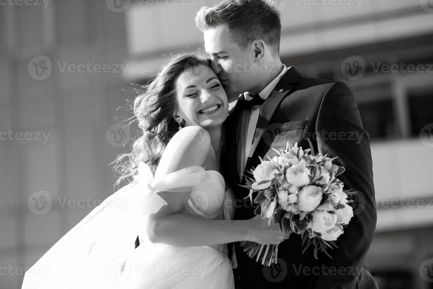 bride and groom first meeting on the roof of skyscraper photo