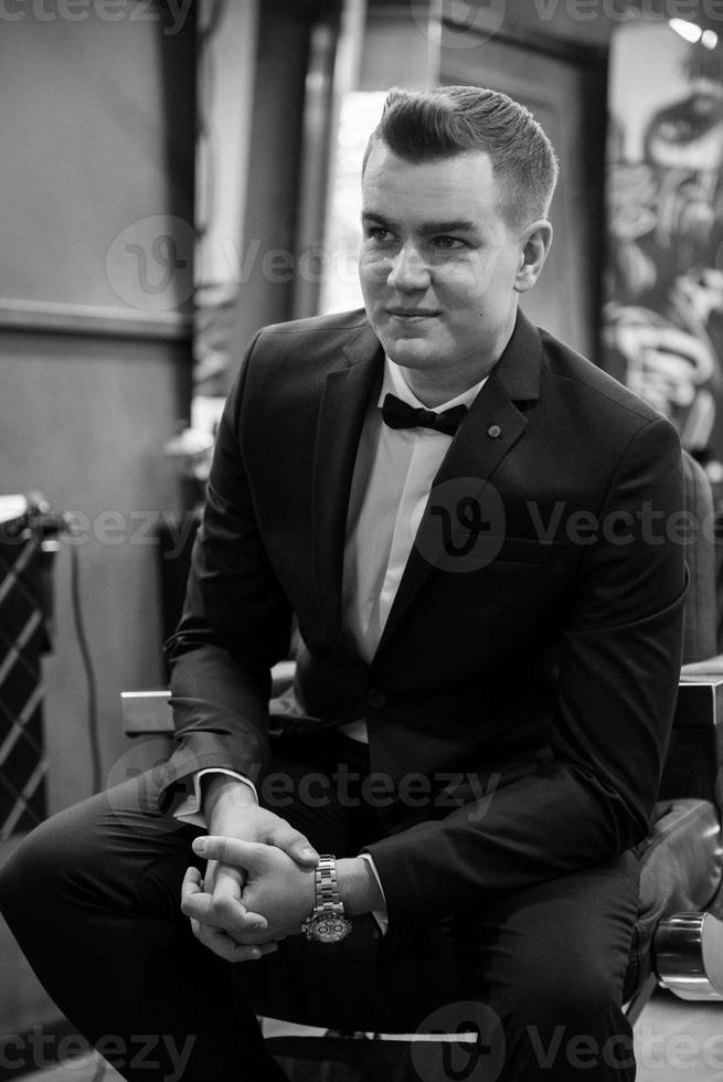 groom in the barber shop photo