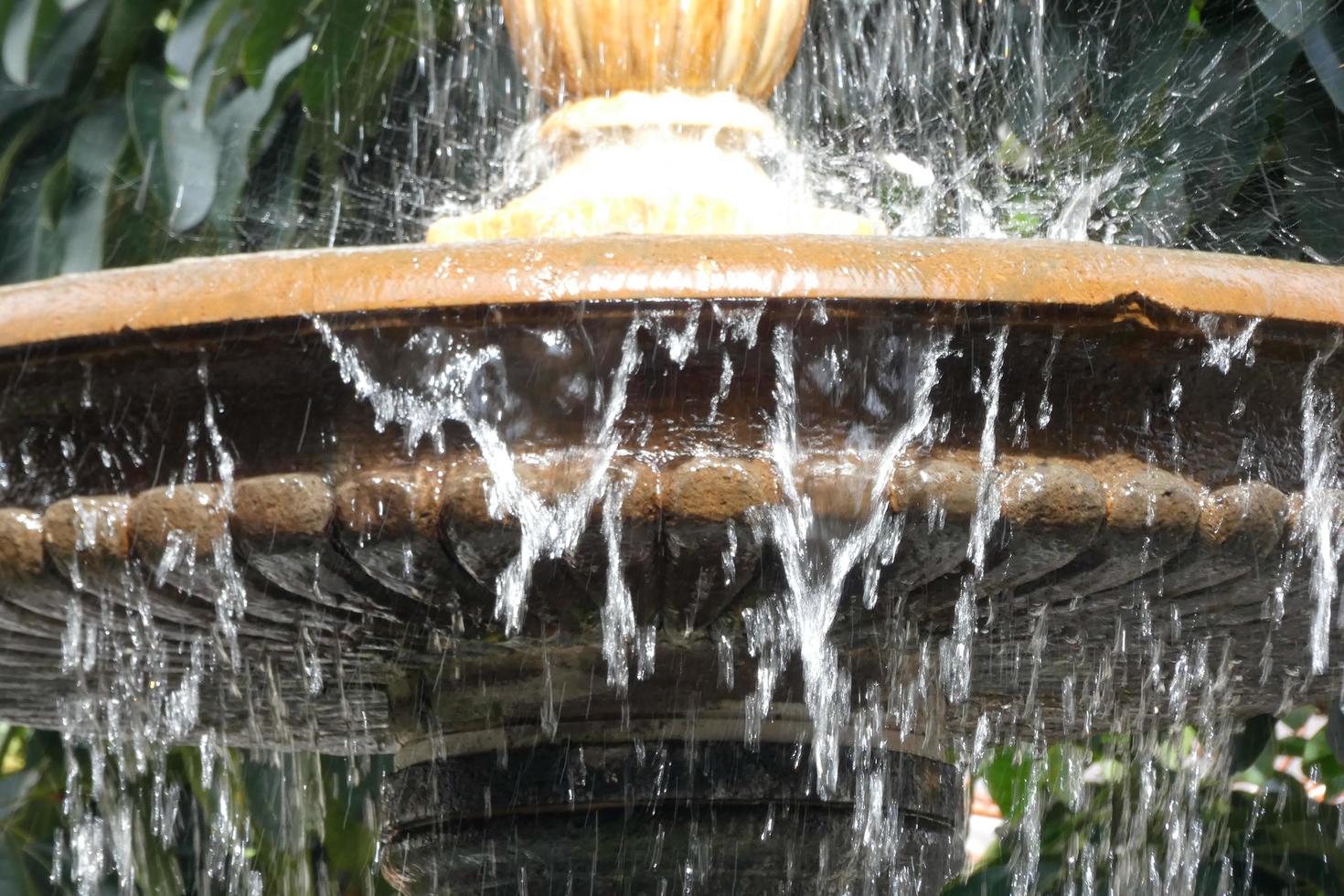Urban ornamental water fountain in the city centre photo