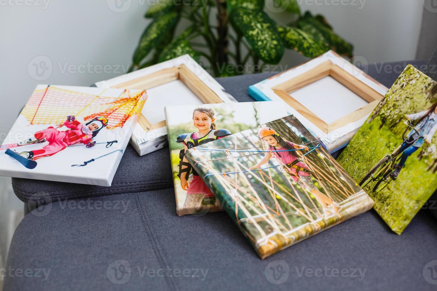 Photography canvas prints. Stacked colorful photos with gallery wrapping method of canvas stretching on stretcher bar, lateral side