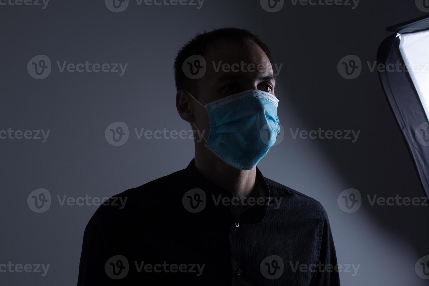 man in a protective mask, the H1N1 Virus photo