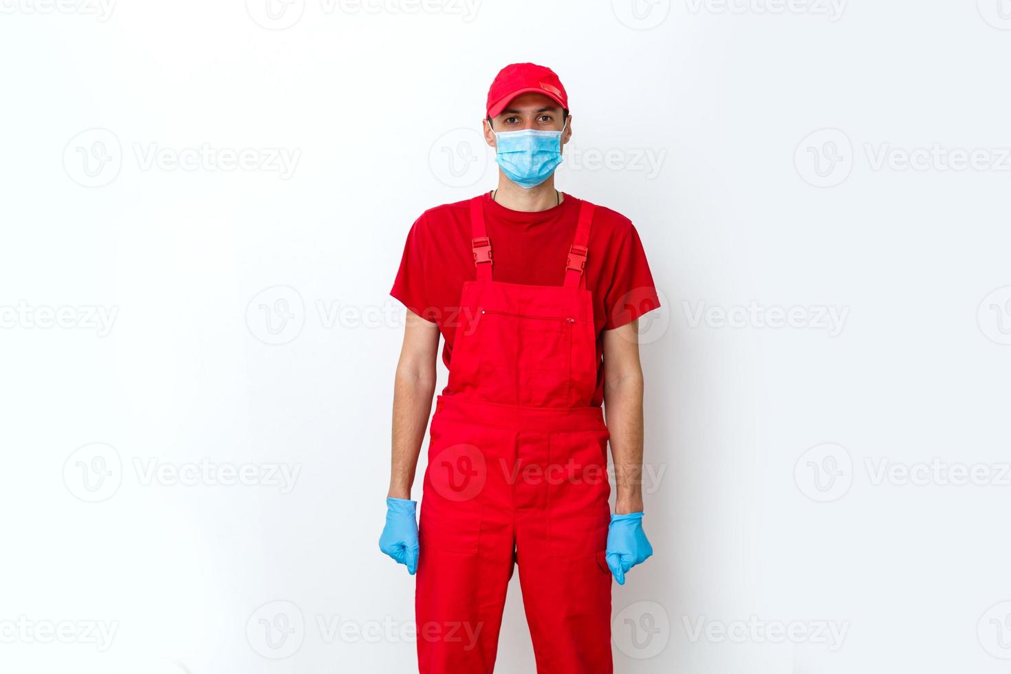 Construction worker with protective mask isolated on white photo