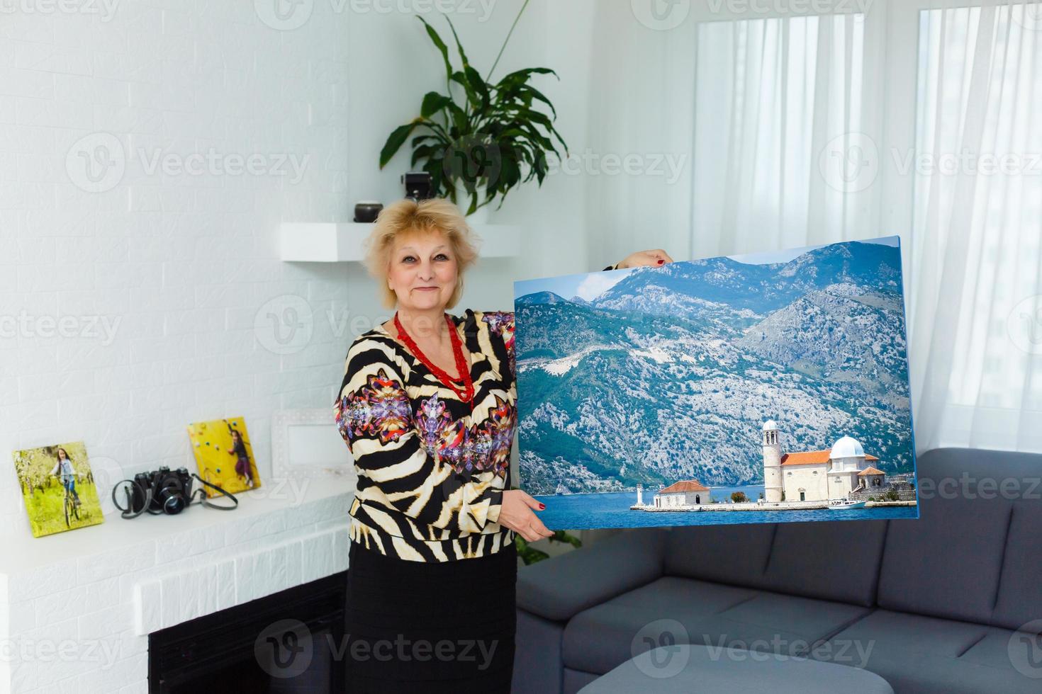 photo canvas. Blonde elderly woman feeling motivated while taking photo canvas