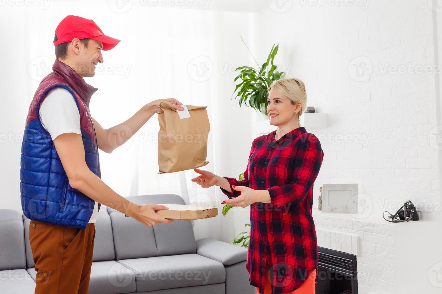 Driver holding paper bag, Delivering On Line Grocery Order photo