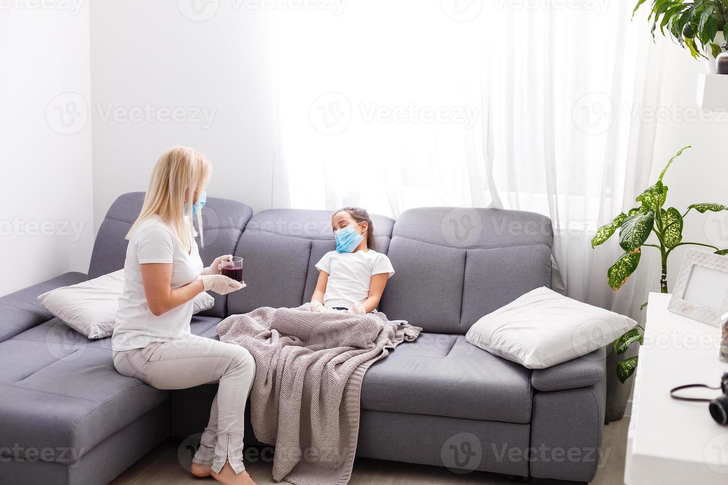 sick daughter wearing protective mask hugging her mother telling about her problems, mother love, people person family concept photo