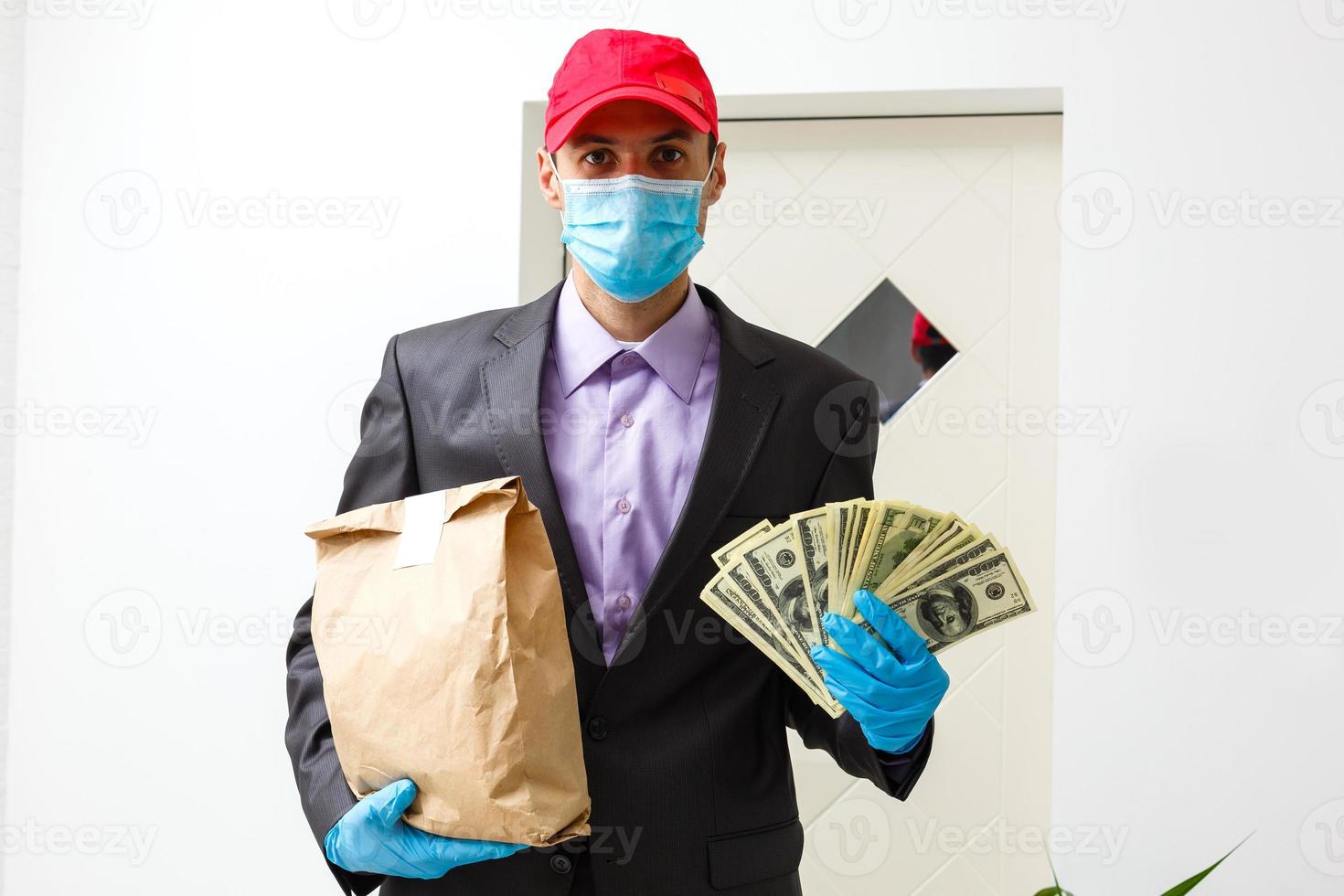 food delivery man Wearing Medical Mask. Corona Virus Concept photo