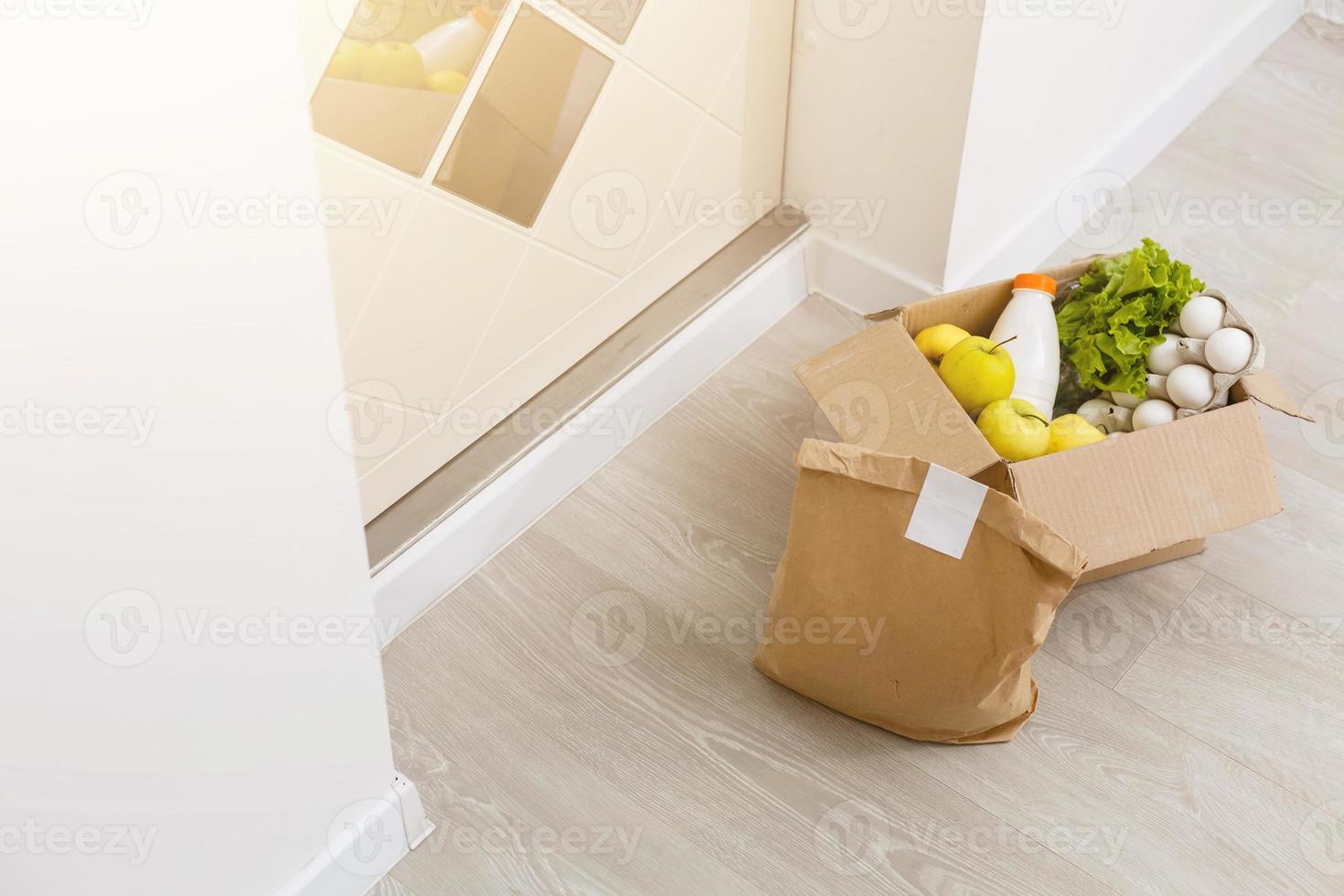 carton box on the floor of entry of the house photo