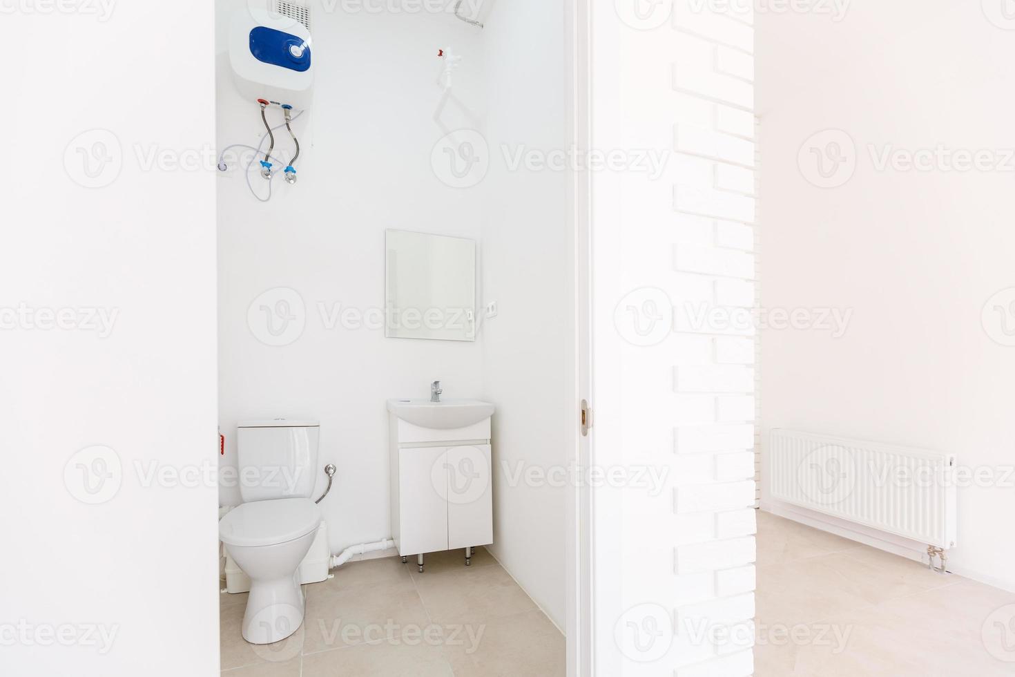 small toilet in a small office photo