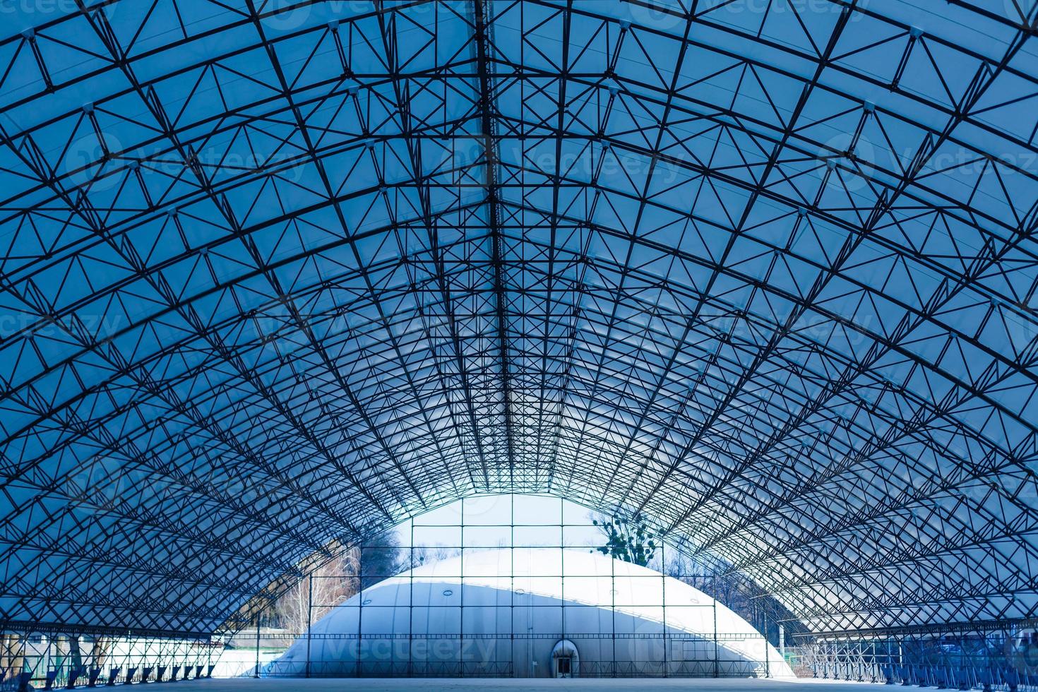 Double exposure photo of transparent circular glass ceiling roof at two different zooms. Realistic but not real architectural image with doubled number of circles compared to the real object.