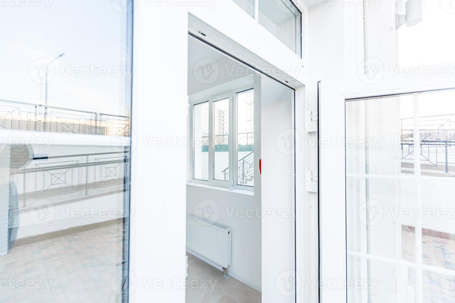 The glass door of white office photo