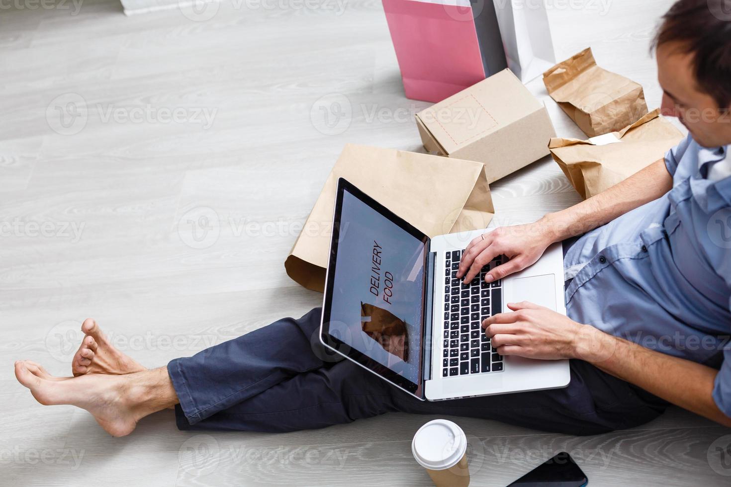 startup small business entrepreneur with laptop, a freelance man working a box, Young Asian business owner at home office, online marketing packaging box and delivery, technology SME delivery concept photo