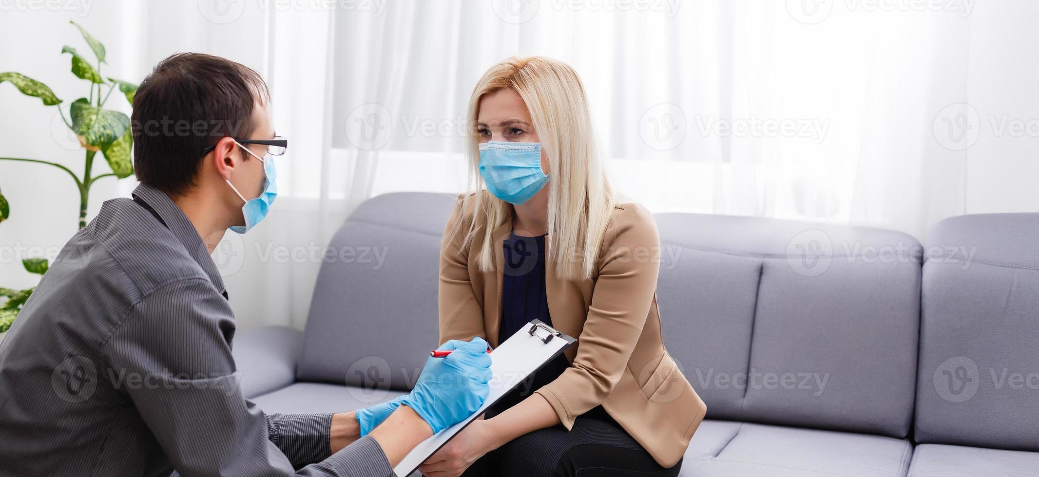 psychologist and patient during quarantine coronavirus photo