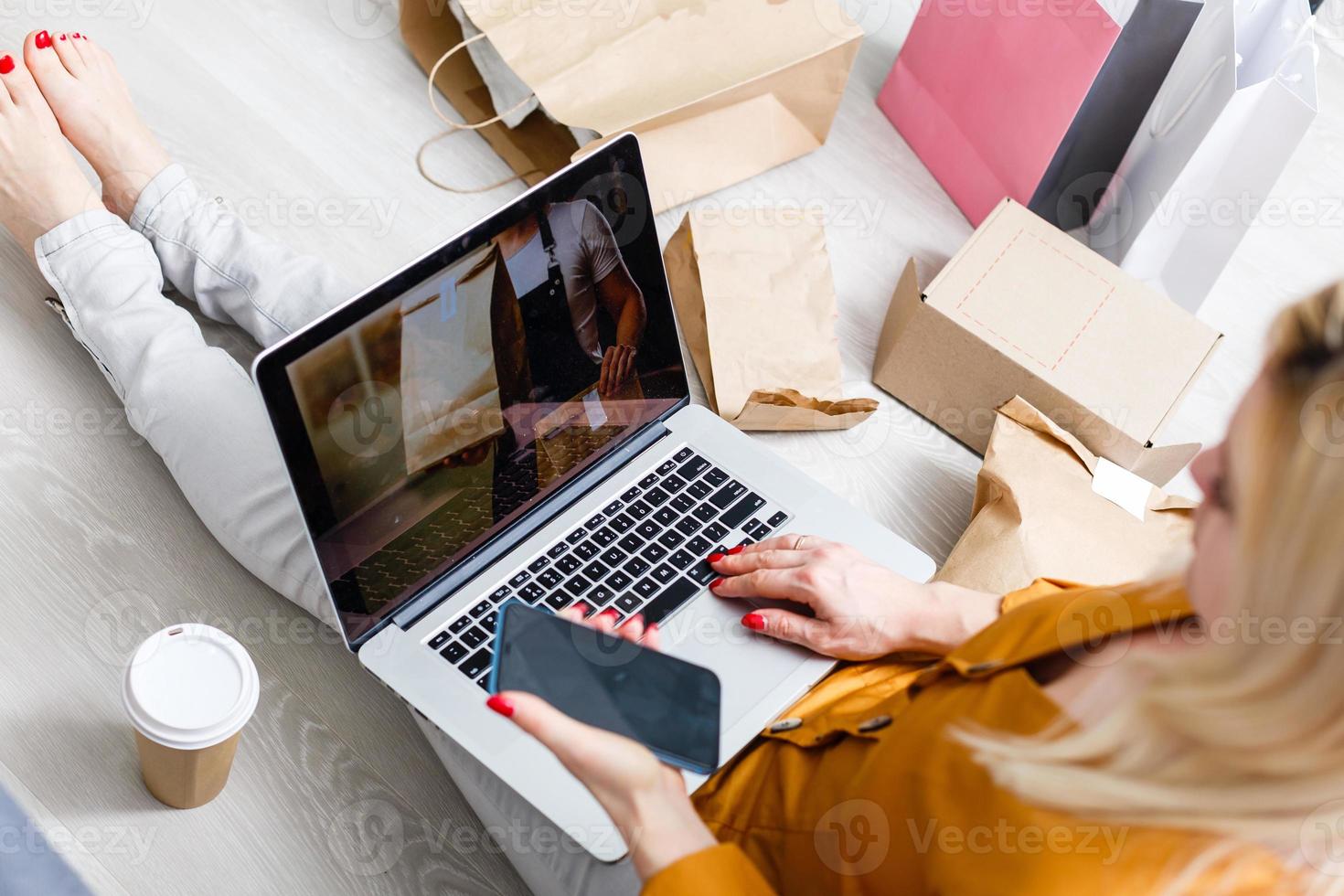 Close up woman sitting use credit card pay for food online order on laptop computer in add to cart function webpage at home,Digital marketing concept.digital lifestyle living photo
