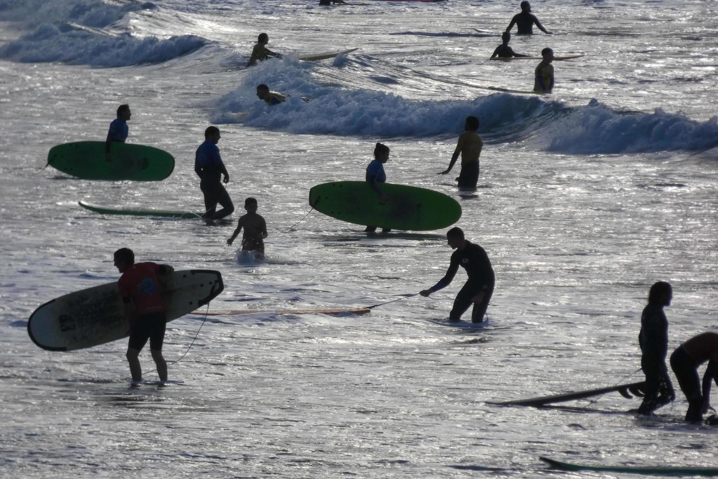 Surf school on an ocean beach photo